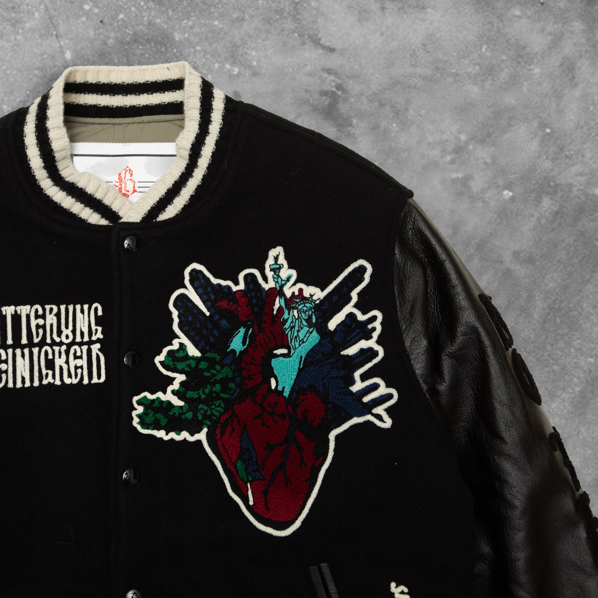 BLACKOUT RUSTY HEART VARSITY