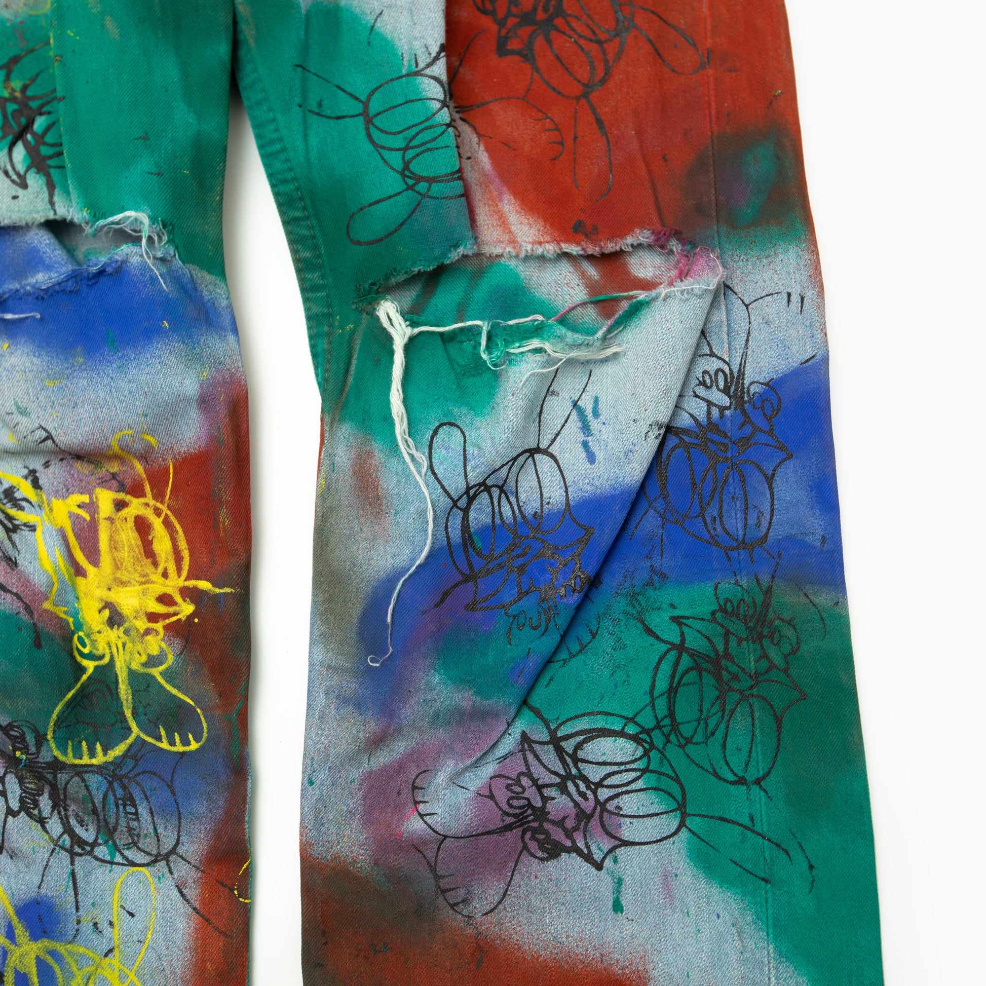SKOLOCT SPRAY PAINTED JEANS