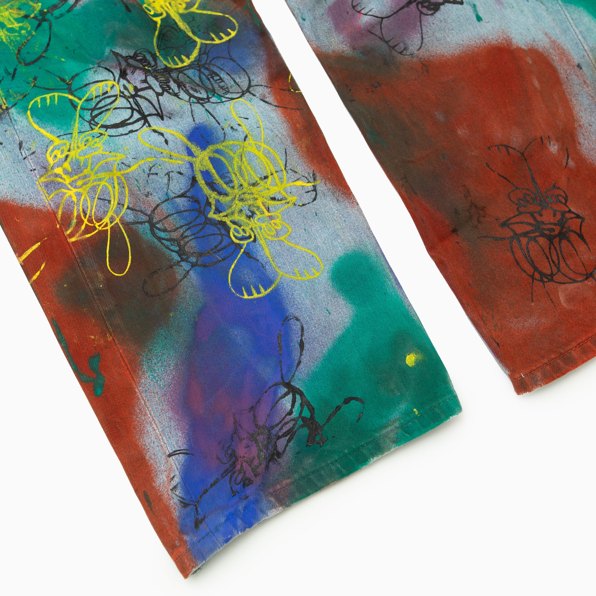 SKOLOCT SPRAY PAINTED JEANS