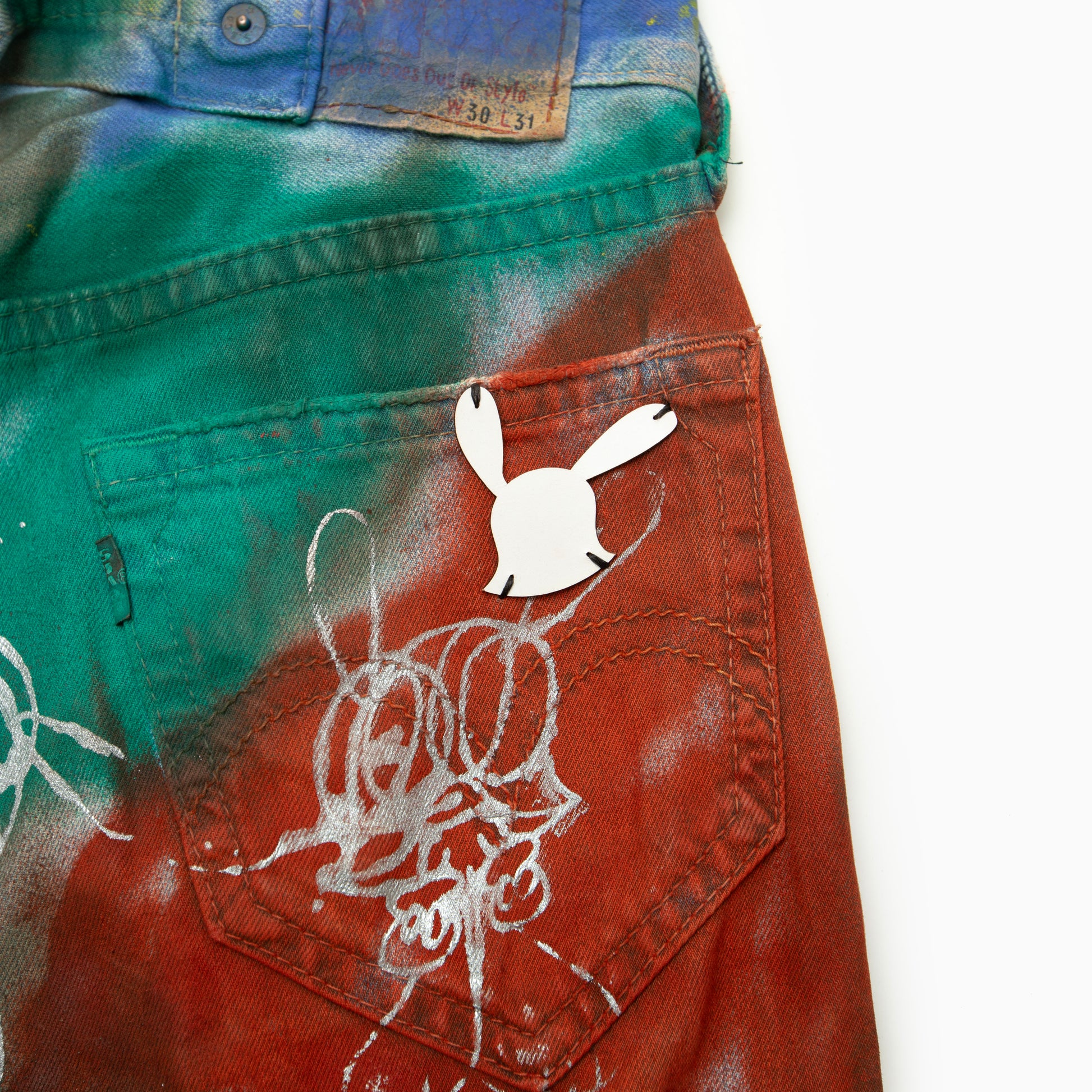 SKOLOCT SPRAY PAINTED JEANS